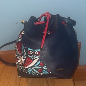 Chumbak Navy Embroidered Bucket Crossbody Bag with Red Trim